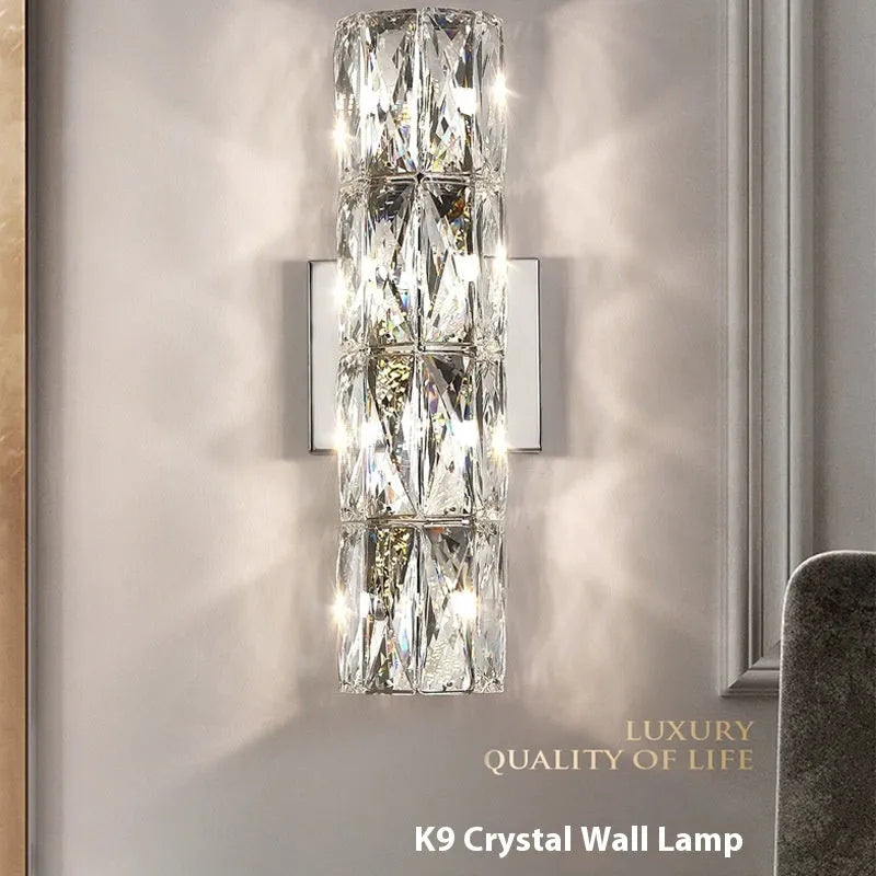 Crystal wall lamp with LED tri-colour light in chrome or gold finish showing multiple size options