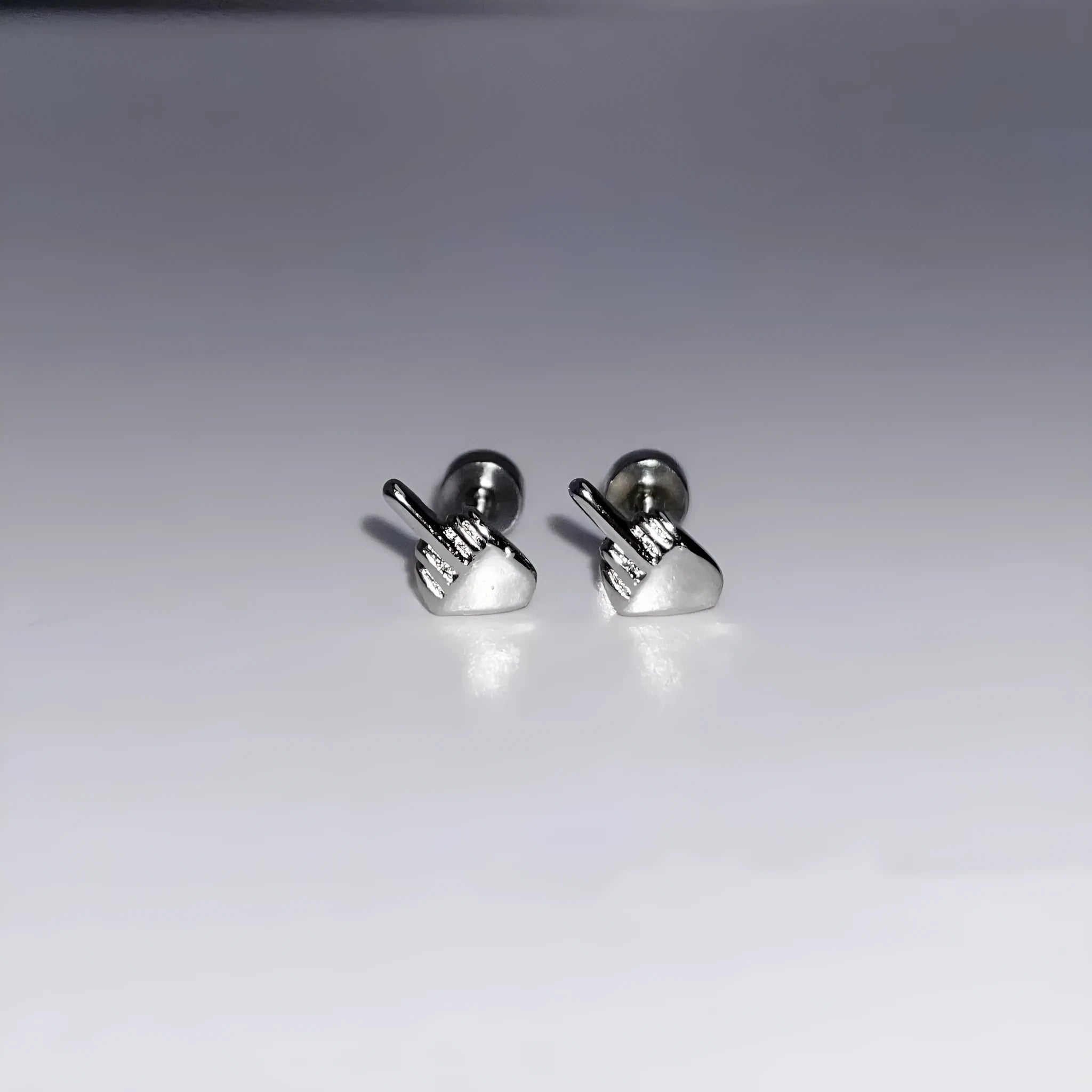 Niche quirky middle finger alloy screw clasp ear cartilage earring for women, vertical motif, bow shape, one pair