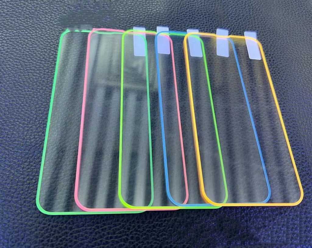 Luminous pink tempered glass screen protector fitted on an iPhone 13 Pro.