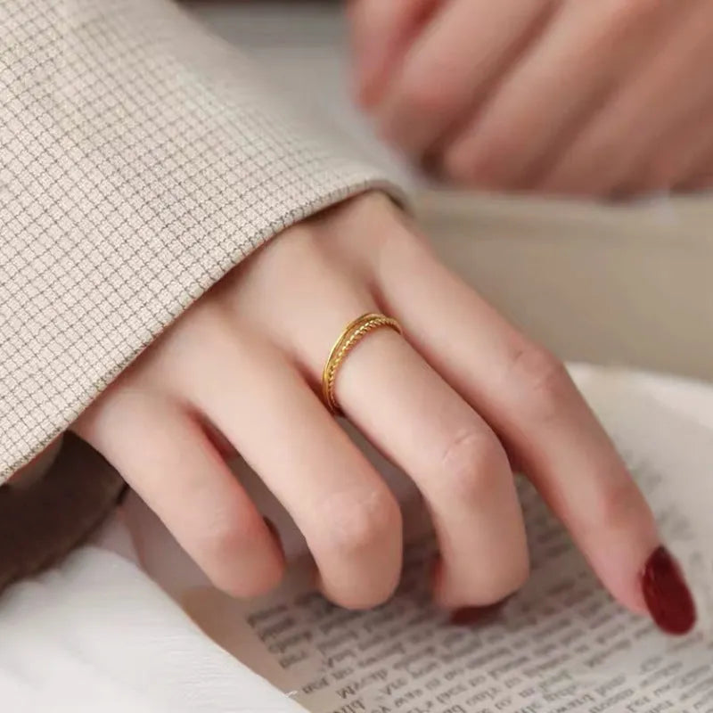 Brass gold plated women's ring showing twist, simple bracelet matte, and simple bracelet glossy style options