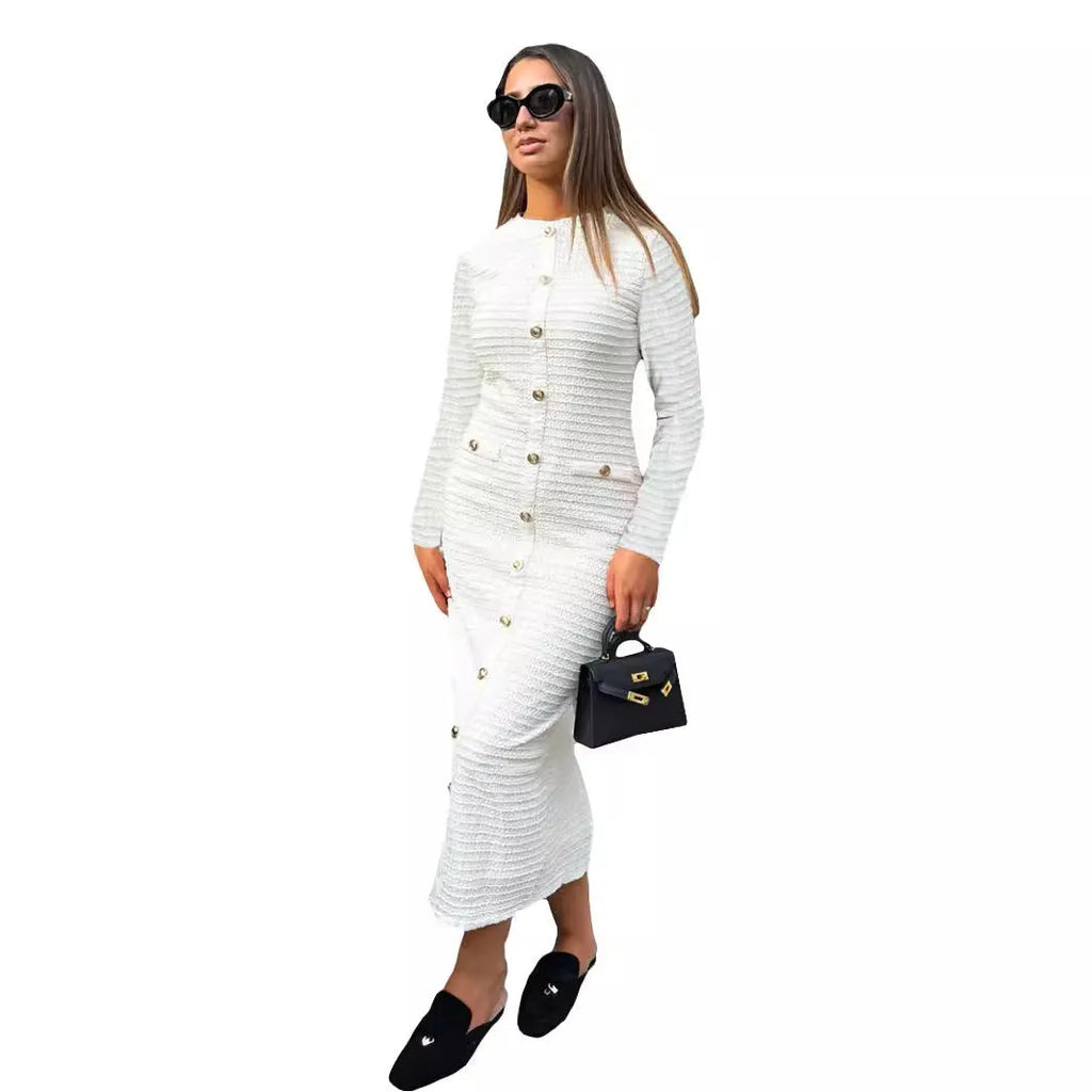 French retro slim fit knitted long sleeve dress in black, showing button detail and one-step skirt.