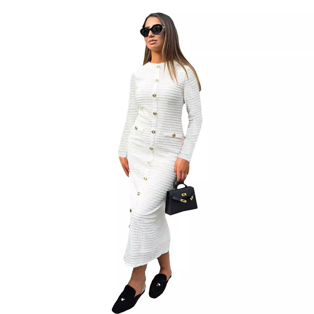 French retro slim fit knitted long sleeve dress in black, showing button detail and one-step skirt.
