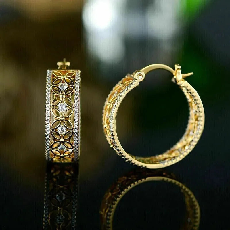 Copper geometric ear clips with horse eye flower butterfly motifs in yellow gold colour