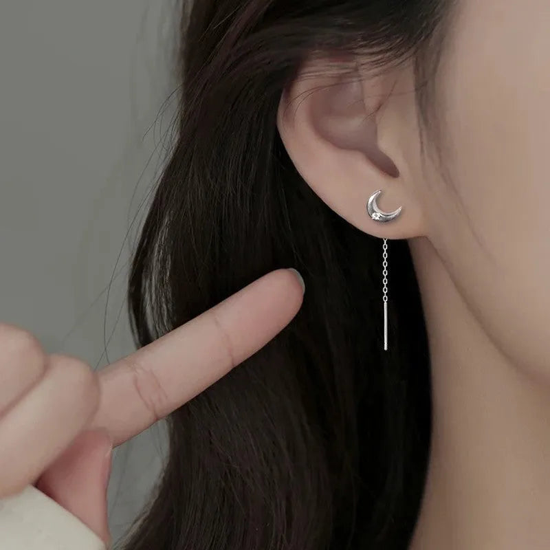 Long sterling silver needle ear string with a choice of geometric or pearl pendants for women.