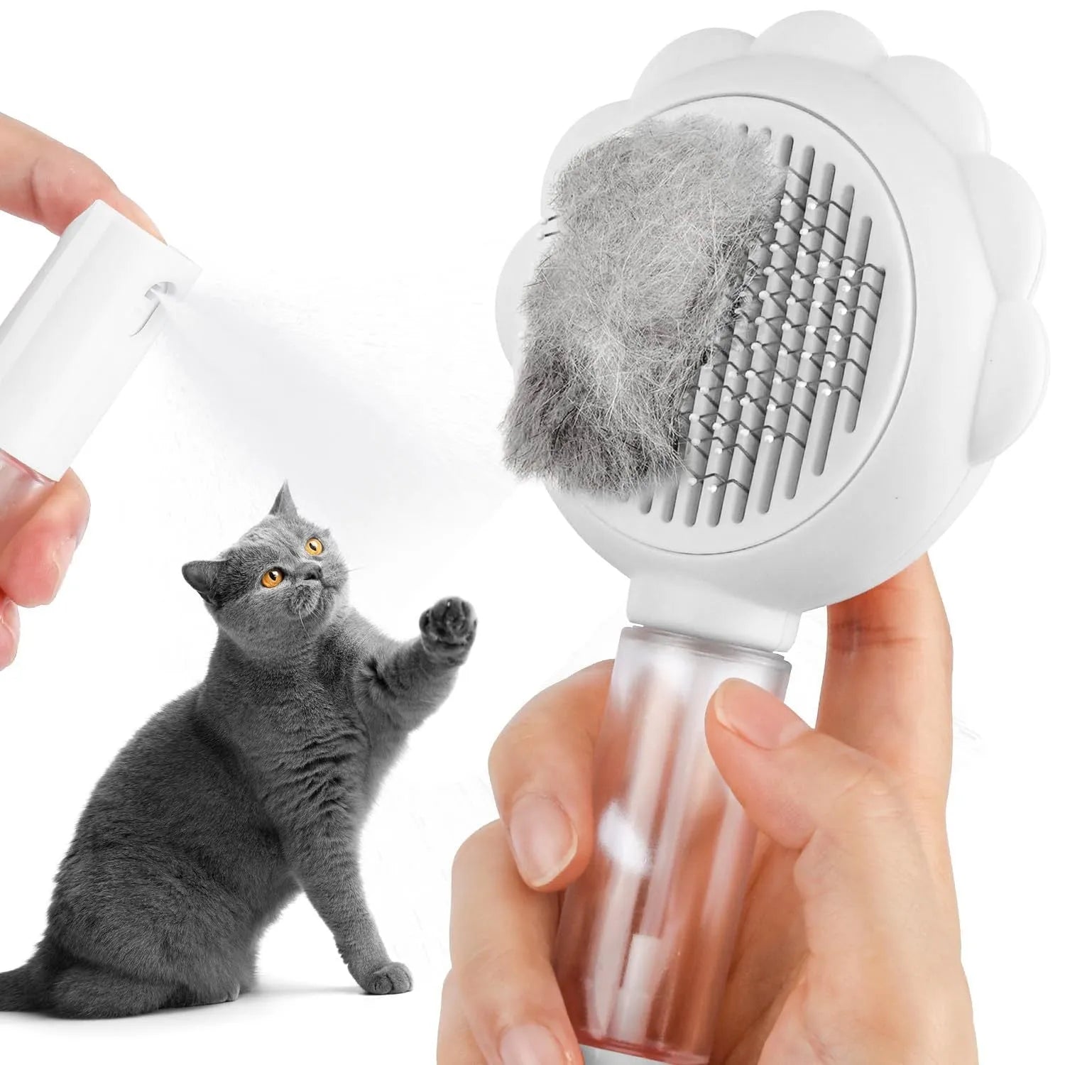 Grey self-cleaning cat brush with spray function and stainless steel bristles on a white background.
