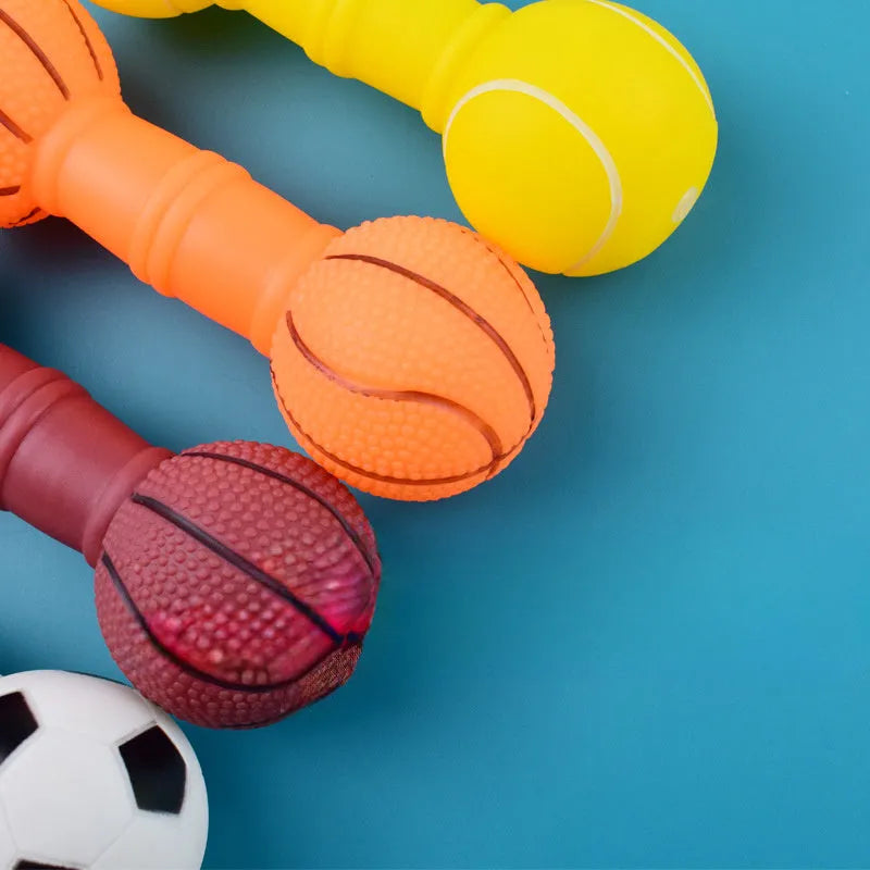 Football dumbbell shaped dog chew toy with squeaker in brown, orange, white, and yellow colour options.