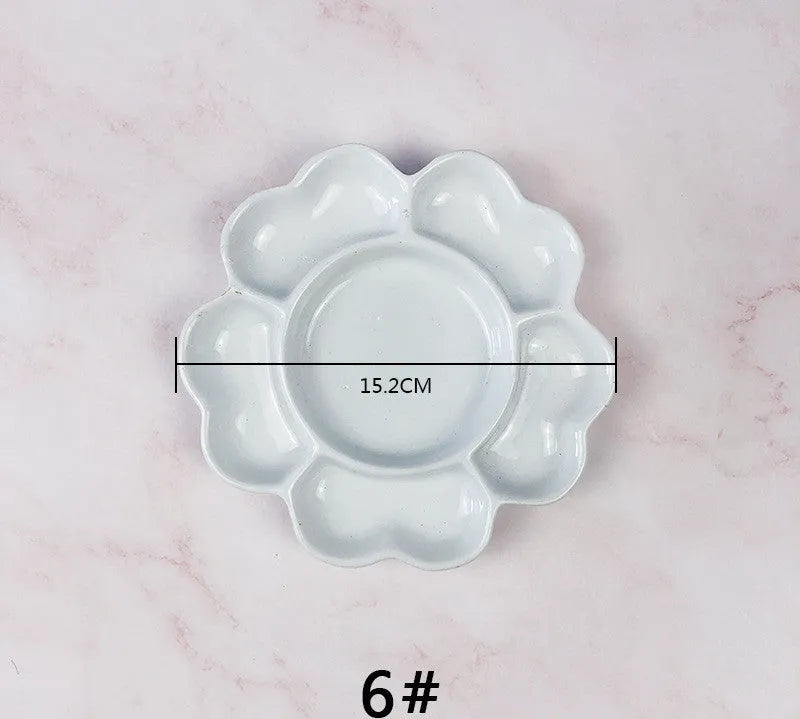 White ceramic plum blossom shaped painting palette for watercolour acrylic oil paints