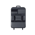Black leather car seat back hanging storage organiser bag with handle shown mounted on a headrest.