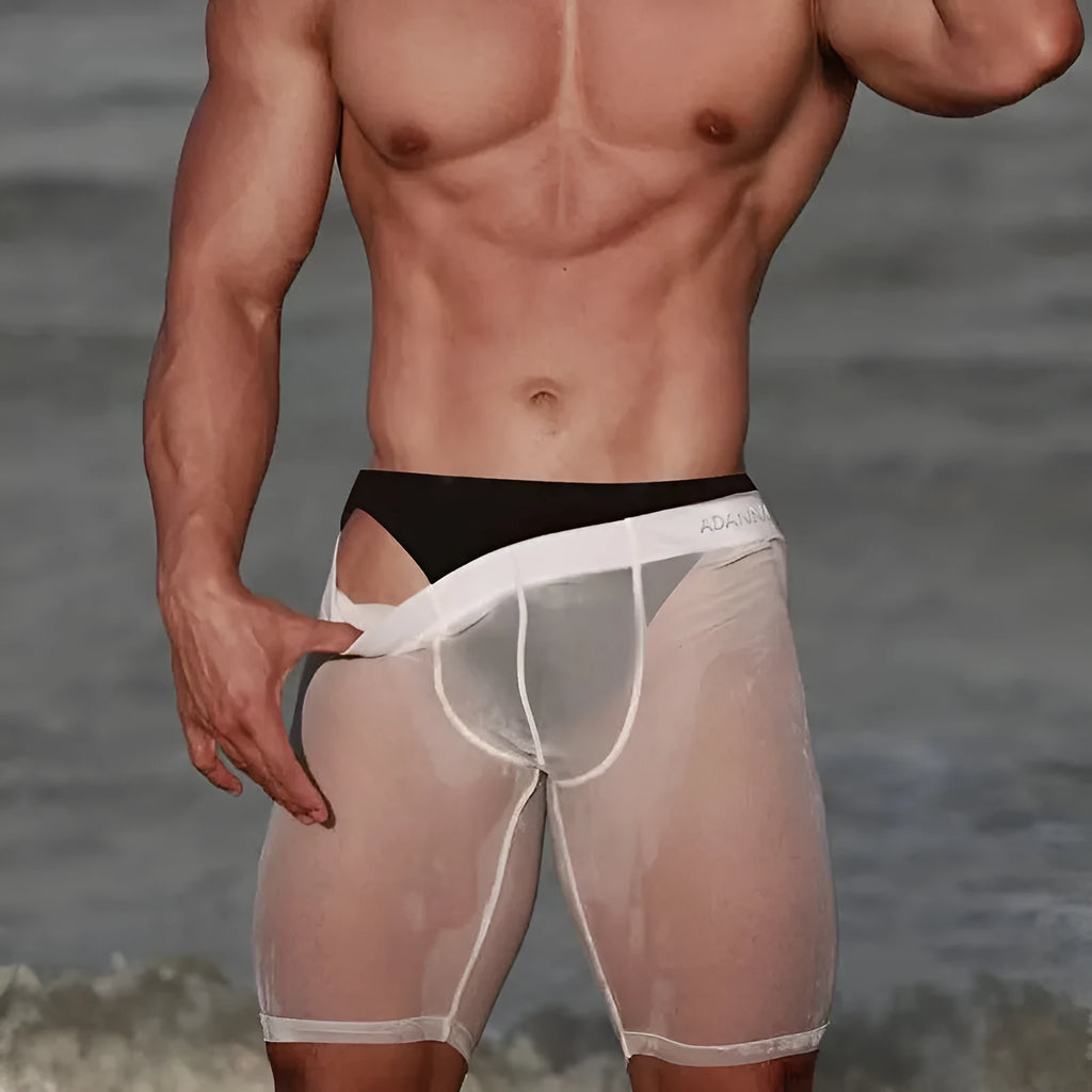 Men's solid-colour seamless nylon mesh shorts shown in black, white, and pink.