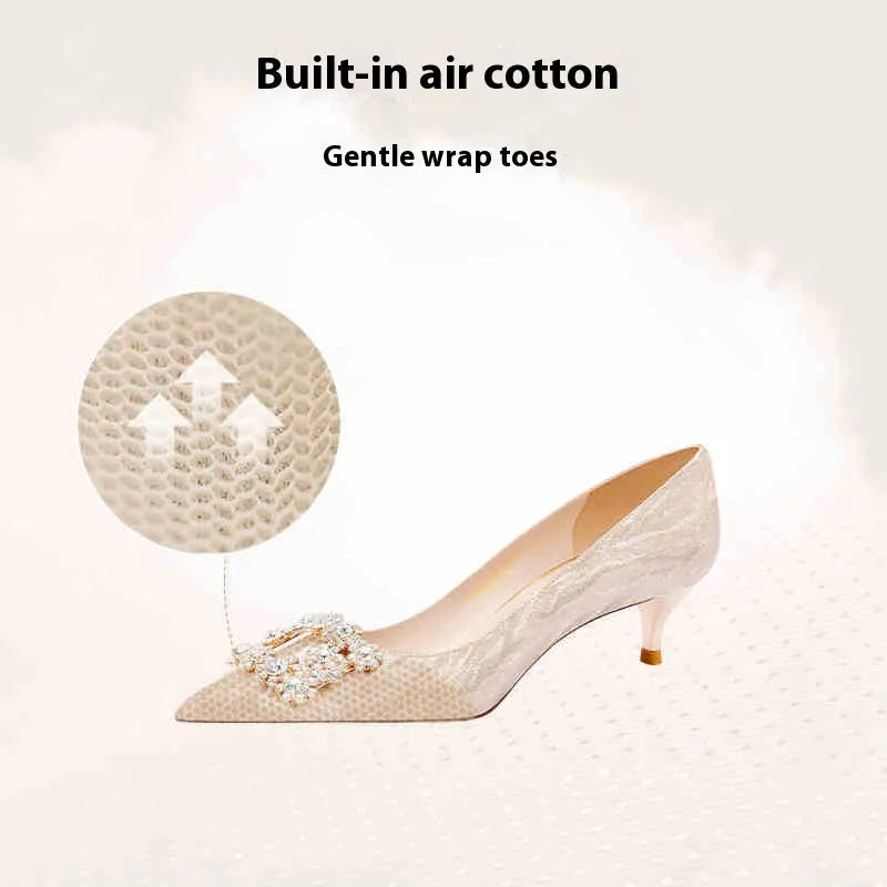 Champagne gold women's high heel pumps with pointed toe and stiletto heel on a plain background.