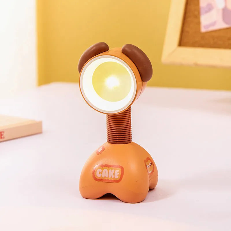Cartoon animal magnetic night lamp with adjustable head on metallic surface