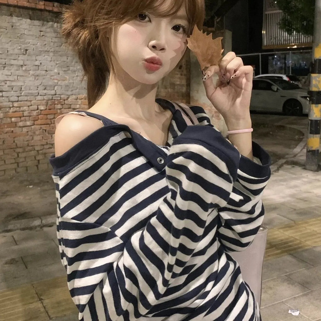 Dark blue oversized women's long sleeve t-shirt with embroidery and a striped pattern, Korean style.
