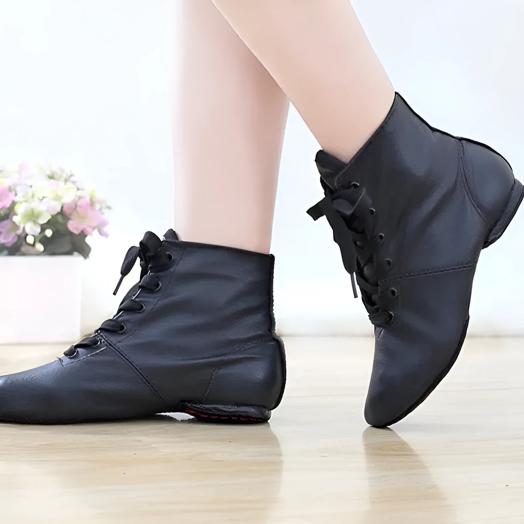 Genuine leather ballet shoes with cowhide suede sole in pigskin outsole colour on a dance studio floor