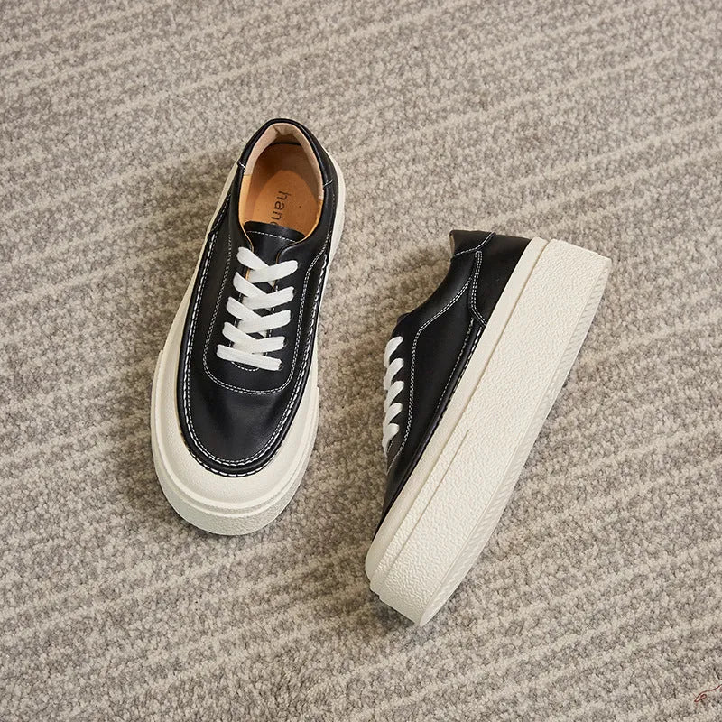 Women's black platform sports board shoes with embossed cowhide leather and rubber sole