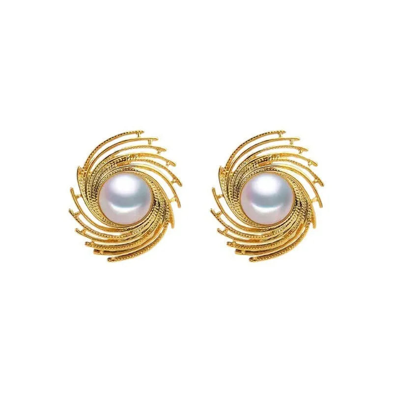 Flower shaped vintage earrings with exaggerated pearl centres and irregular design elements