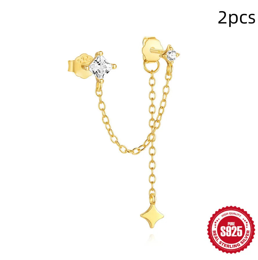 Golden geometric S925 sterling silver stud earrings with zircon inlays, showing clover, crown, and chain horse eye designs.