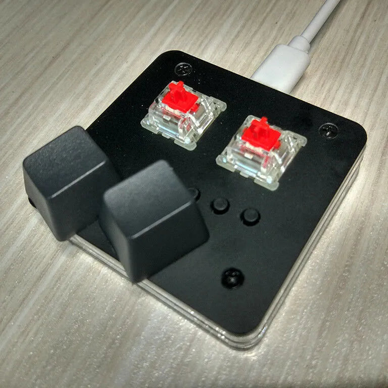 Mini multimedia keyboard with USB cable in black, grey, pink, or white colours