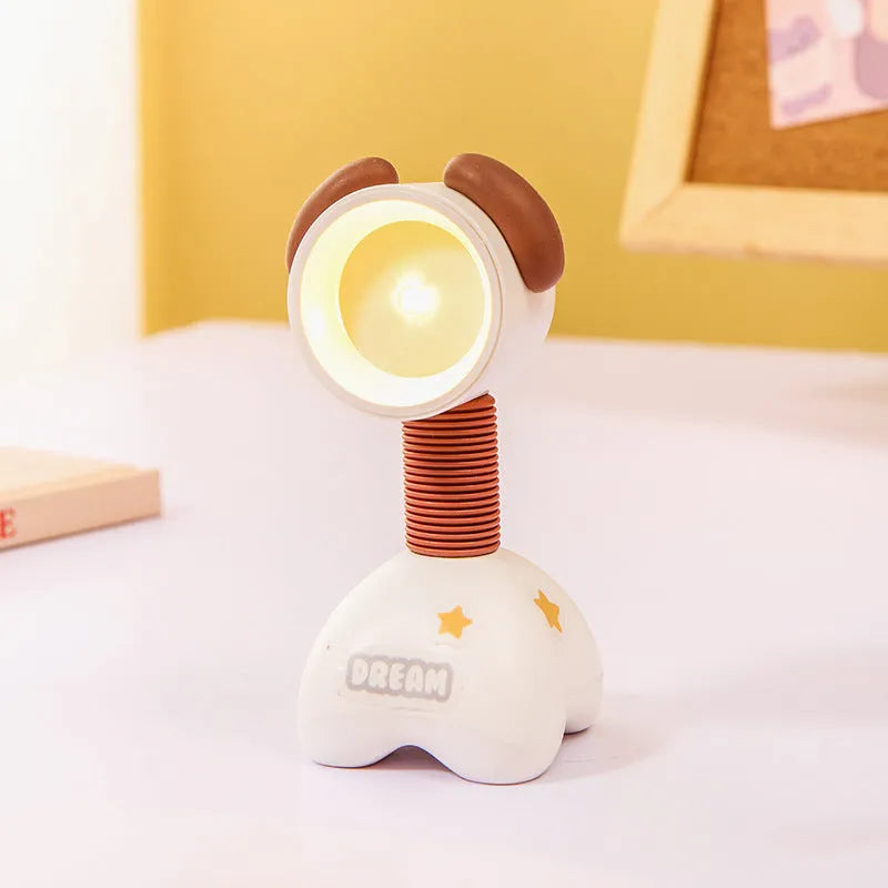 Cartoon animal magnetic night lamp with adjustable head on metallic surface