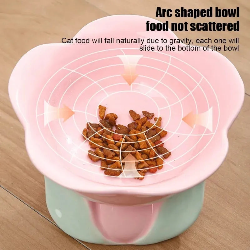 Blue floral patterned ceramic pet bowl with elevated design and non-slip base for cats and small dogs