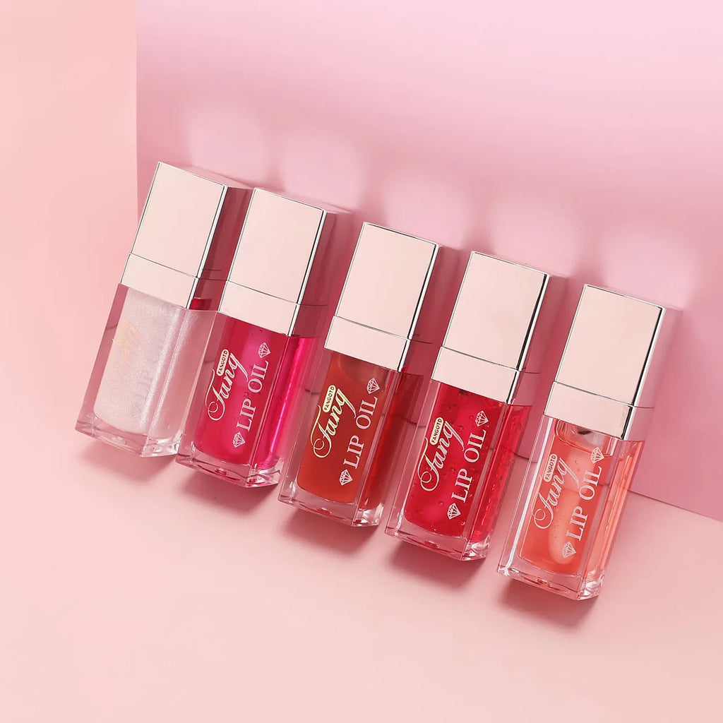 Set of five mint lipstick lip gloss tubes in shades 001, 006, 007, 012, and 015.
