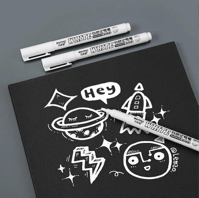Super White Dazzling fine head painting pen with 2.8mm thick white tip, 14cm length, on dark surface