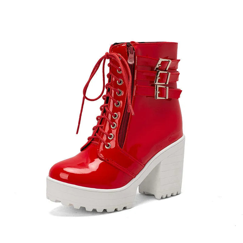 Women's black thick heel ankle boots with lace-up front and round toe on waterproof platform sole