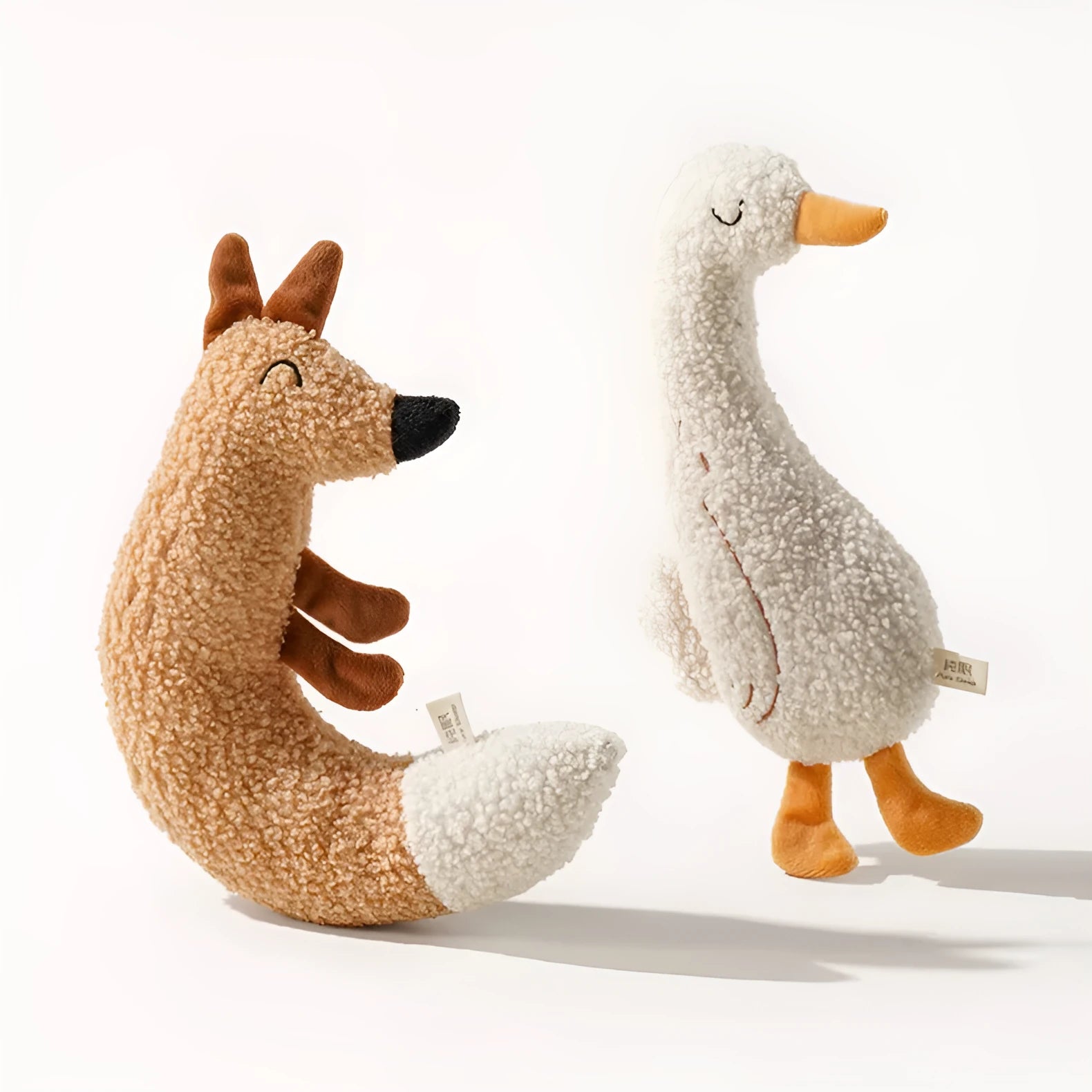 Cartoon pet toy in fox or duckling design with teddy velvet fabric and crinkle sound insert