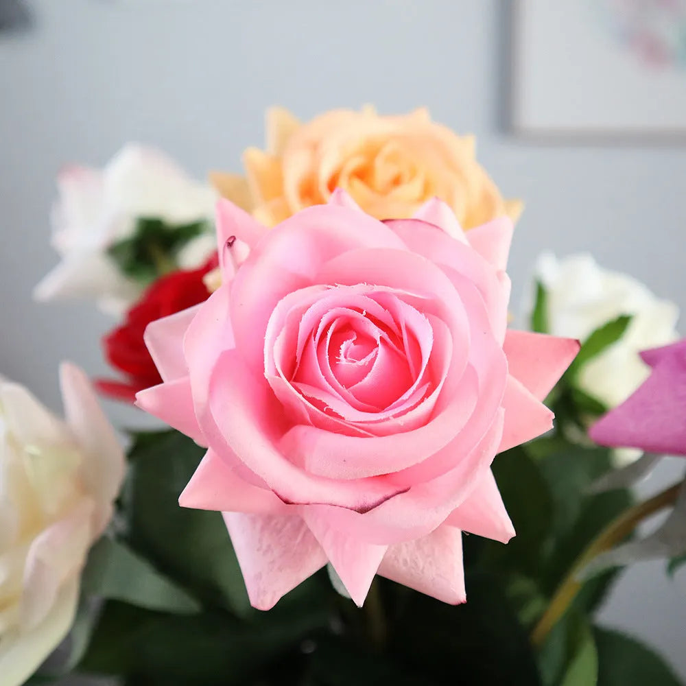 Artificial silk touch rose flower with red petals on a green plastic stem, showing approximate 42cm length.