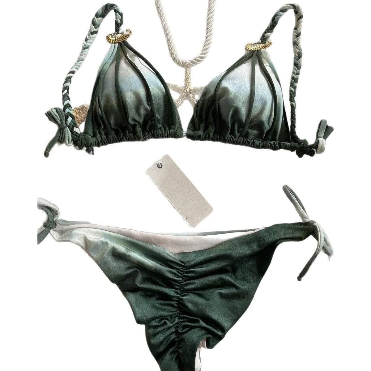 Tie-dyed bikini set in green with high-waist backless briefs on a woman by the seaside
