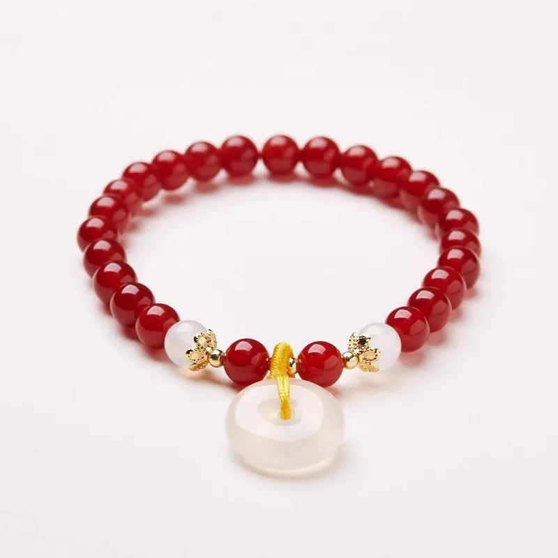Handmade Chinese bracelet with jade safety buckle and red agate peace clasp beads