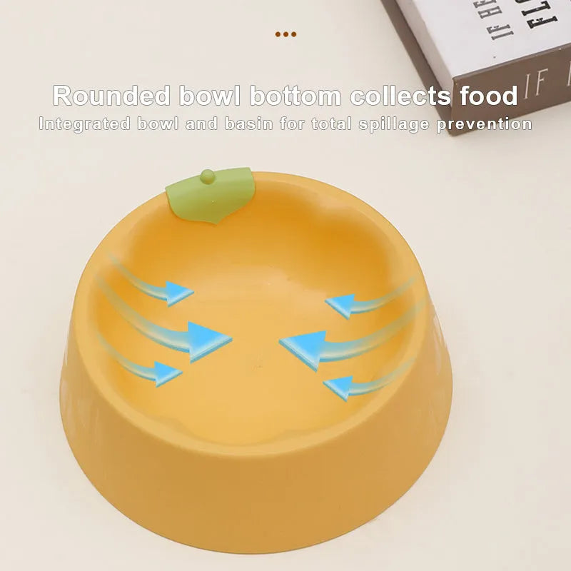Green plastic double pet bowl for dog and cat food and water on a white surface