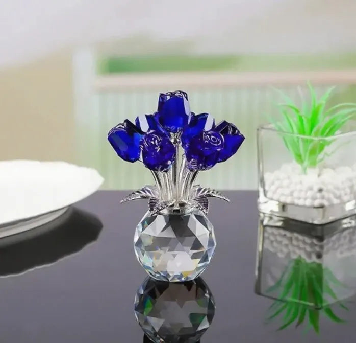 Handmade K9 crystal glass rose ornament in geometric Chinese style on a table.