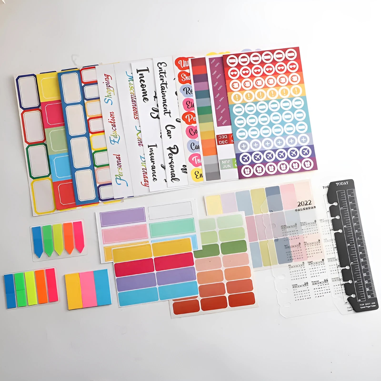 Handwritten label indicating adhesive stickers in white with multiple grid formats and colour options