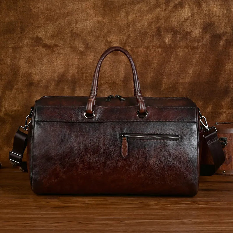 Vintage brown retro leather bag made from top-layer cowhide with under 20L capacity