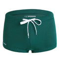 Men's low-waist boxer style swimming trunks with lace detailing in nylon fabric