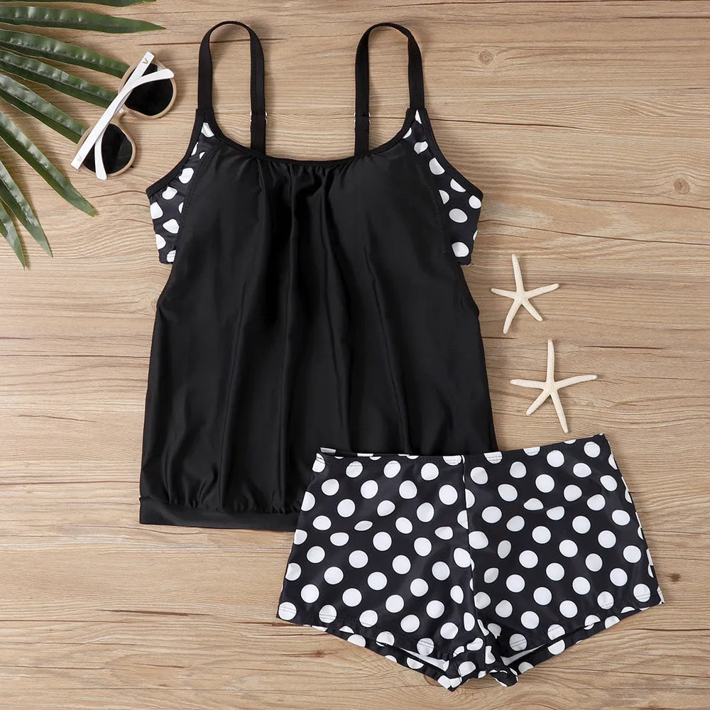 Women's black polka dot high-waist boxer swimsuit briefs for swimming and fitness.