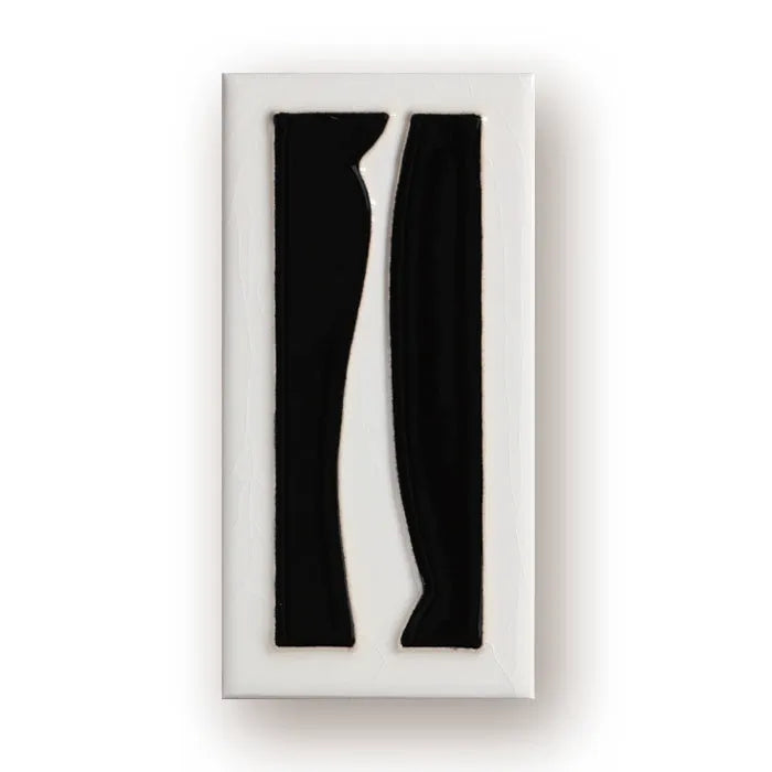 Handmade retro enamel ceramic doorplate showing a number on a glossy surface
