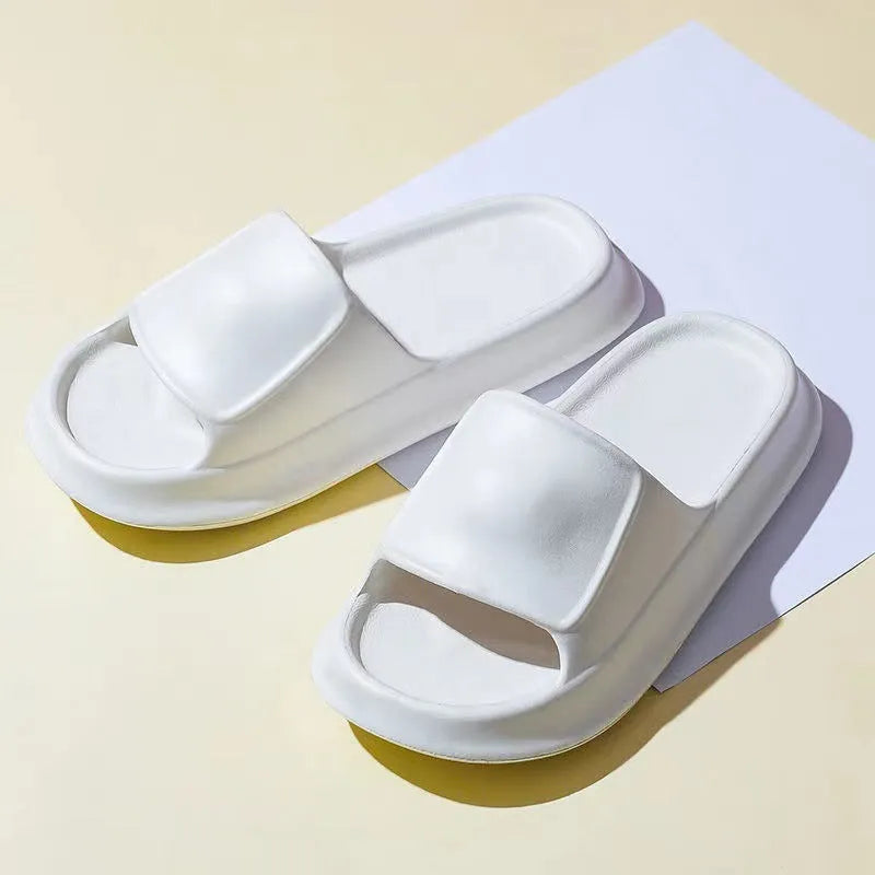 EVA flip-flop slippers with thick sole in multiple colours on a white background