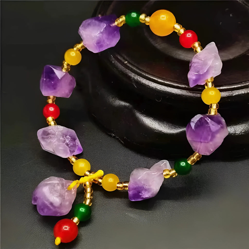 Women's amethyst bead bracelet with fu character charm and natural shaped beads
