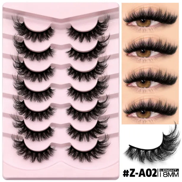 Box of natural long, thick false eyelashes made from artificial fibre with included glue tube.