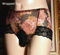 Men's mesh underwear in mid-waist brief style with printed design and breathable ice silk fabric