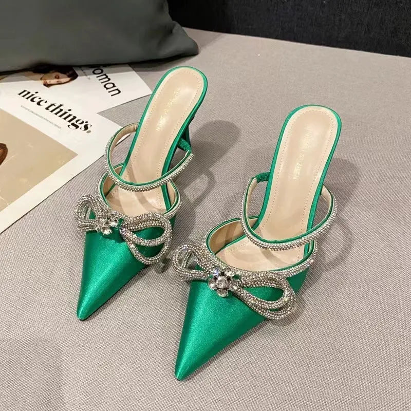 Women's black stiletto heel sandals with silk bandage detail on back and buckle fastening.