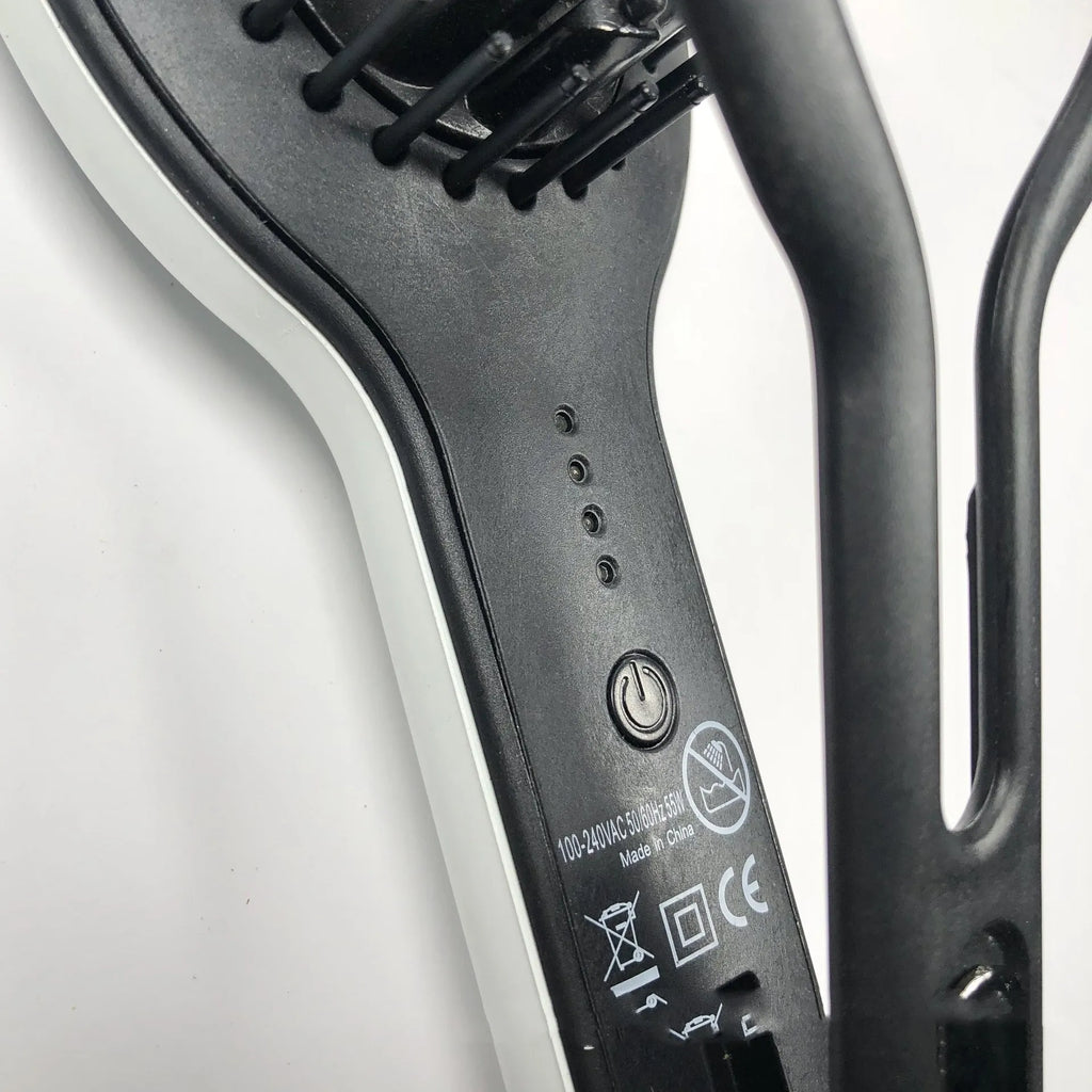Black electric hair straightener and curling iron comb with tourmaline ceramic heat conductor and 10 temperature settings