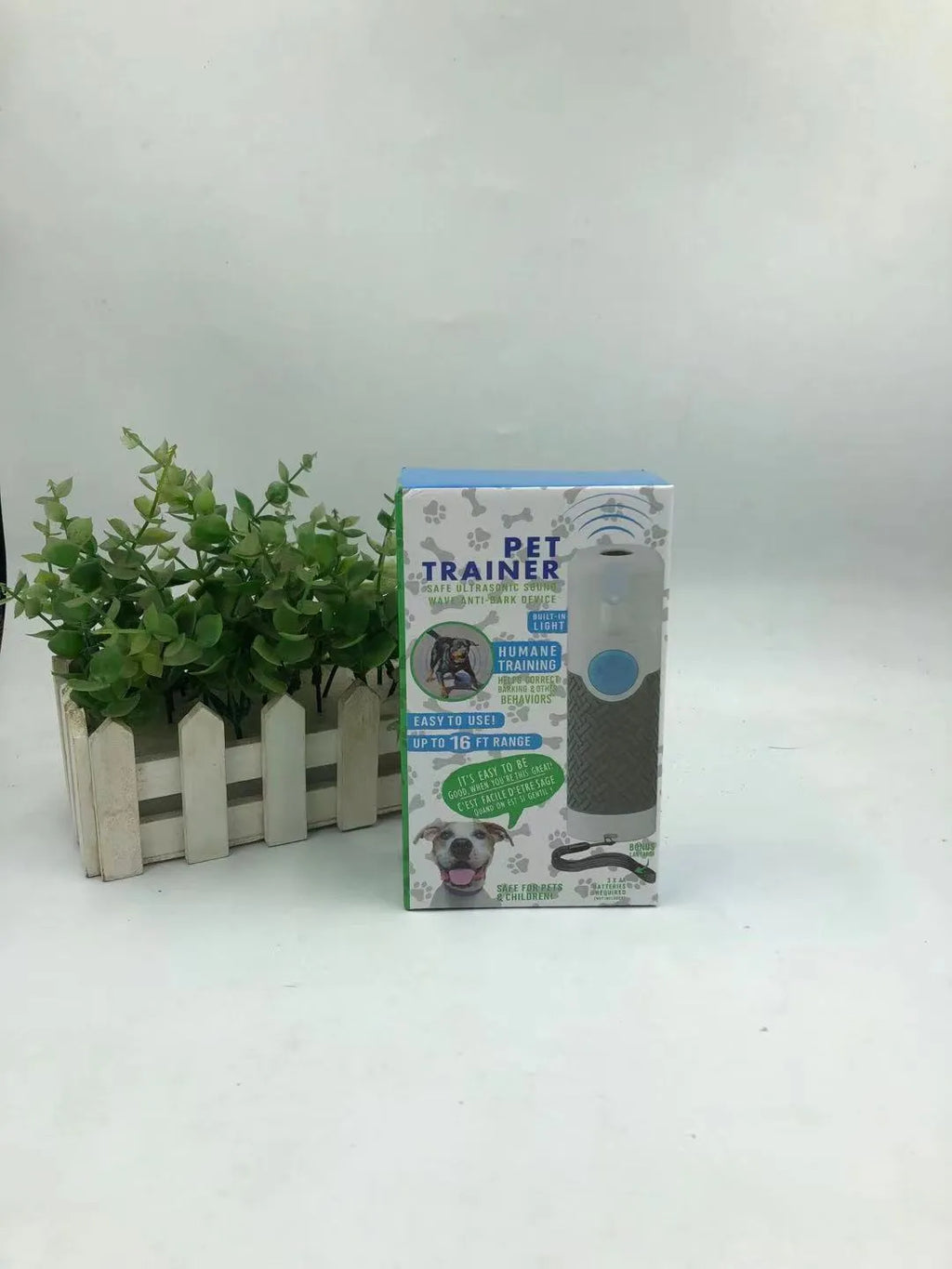 White ABS plastic handheld ultrasonic dog bark trainer device for canine behaviour correction