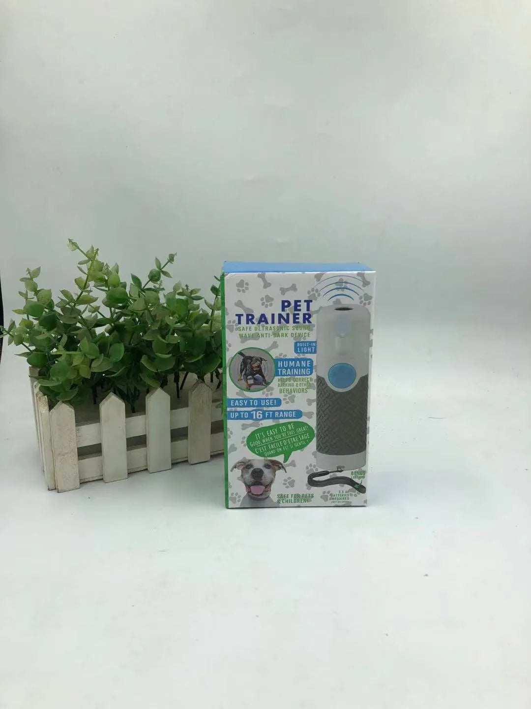 White ABS plastic handheld ultrasonic dog bark trainer device for canine behaviour correction
