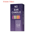 Ear candling kit showing assorted coloured candles, protection boards, and cotton swabs.