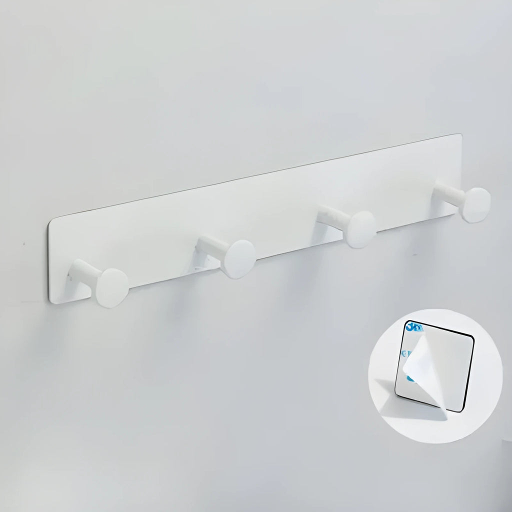 Iron wall-mounted coat hooks with adhesive backing in three sizes for no-drill installation