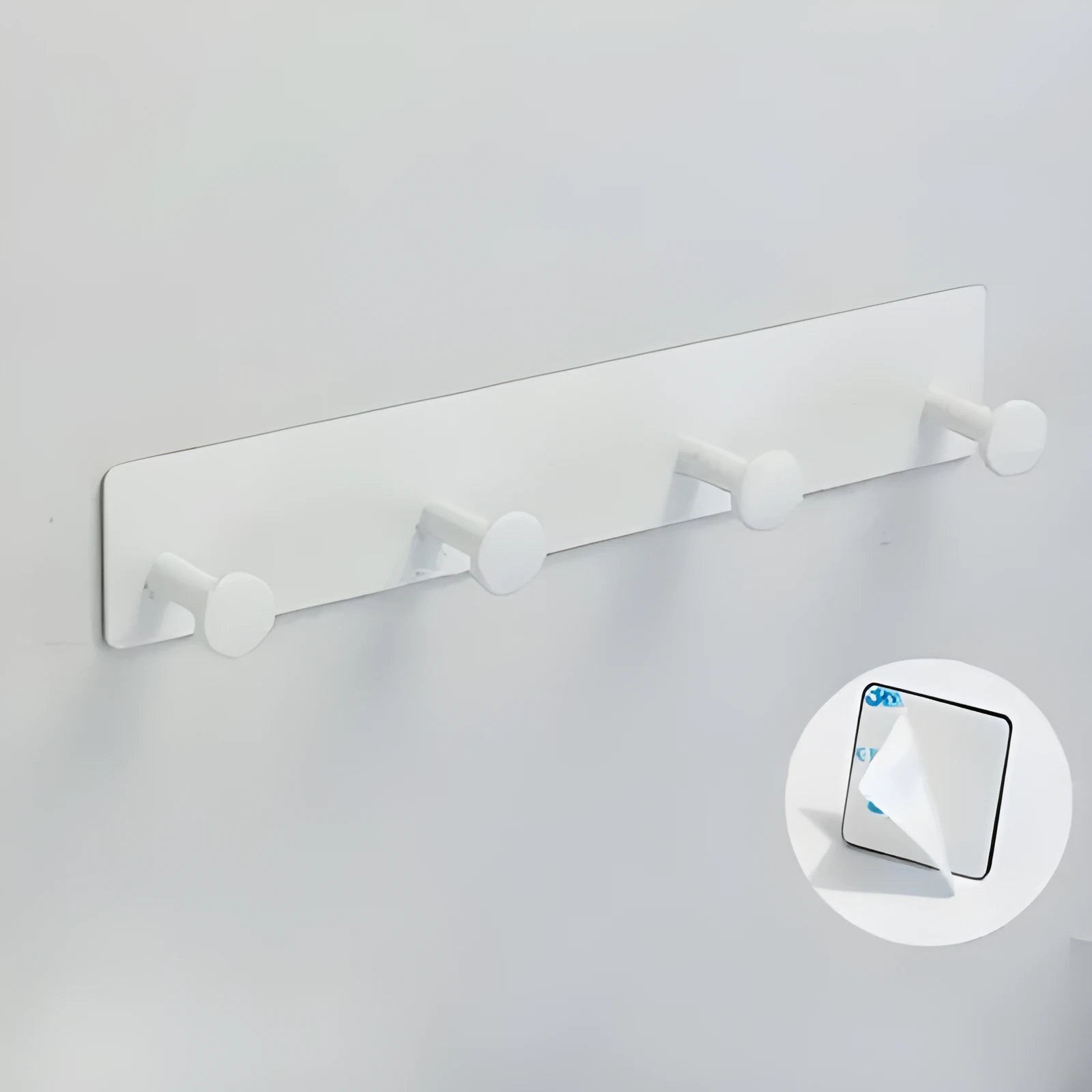 Iron wall-mounted coat hooks with adhesive backing in three sizes for no-drill installation