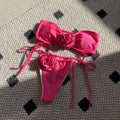 Women's solid colour drawstring tube top and bikini brief swimsuit set on a mannequin.