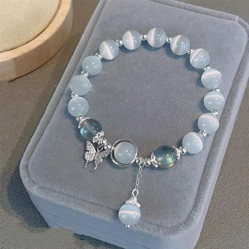 Chinese style glass bracelet with bamboo joint details in a red Lvzhu Duobao design.